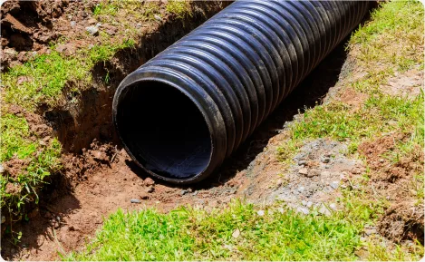 New sewer lateral pipe laid in an open trench
